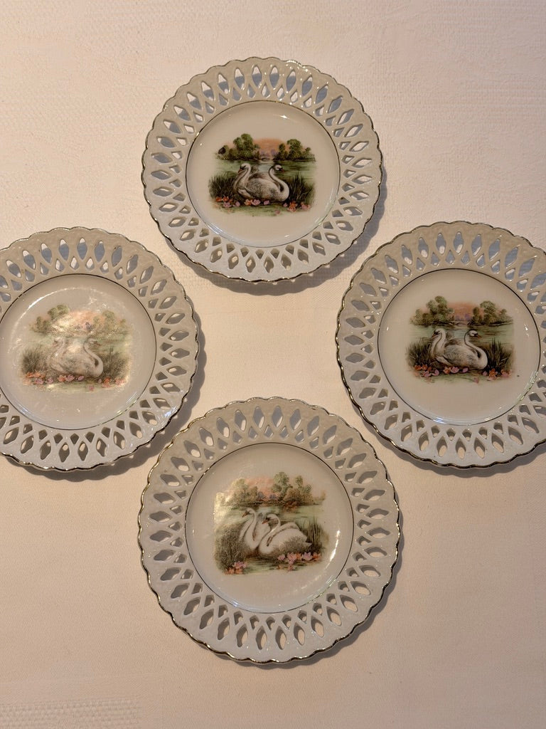 Bordje met zwanen