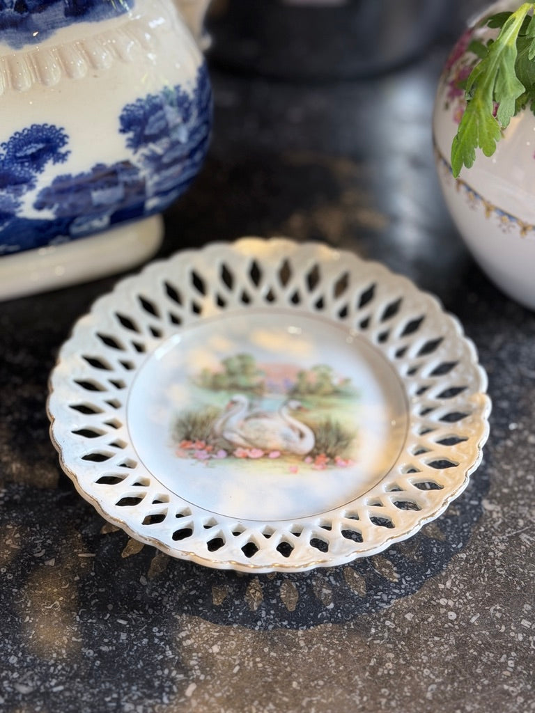 Bordje met zwanen