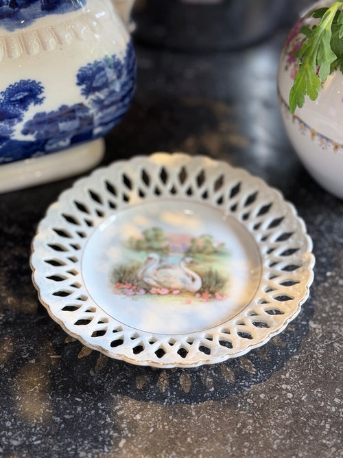 Bordje met zwanen